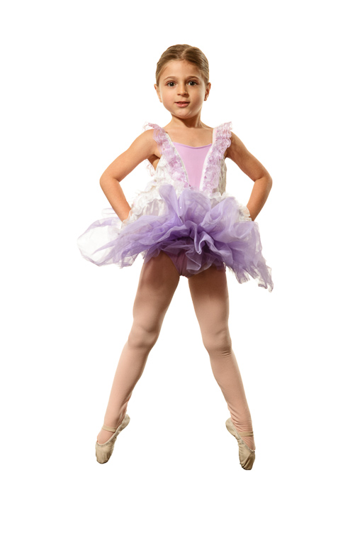 young ballerina in a tutu jumping